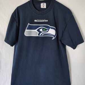 NFL Team Seattle Seahawks with Wilson 3 On the back. Dark Blue T-Shirt. Size L